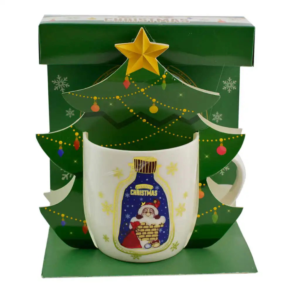 Cana de craciun realizata din ceramica in cutie - Design cu Mos Nicolae si inscriptia "Merry Christmas" - Diverse modele Cana de craciun realizata din ceramica in cutie - Design cu Mos Nicolae si inscriptia "Merry Christmas" - Diverse modele
