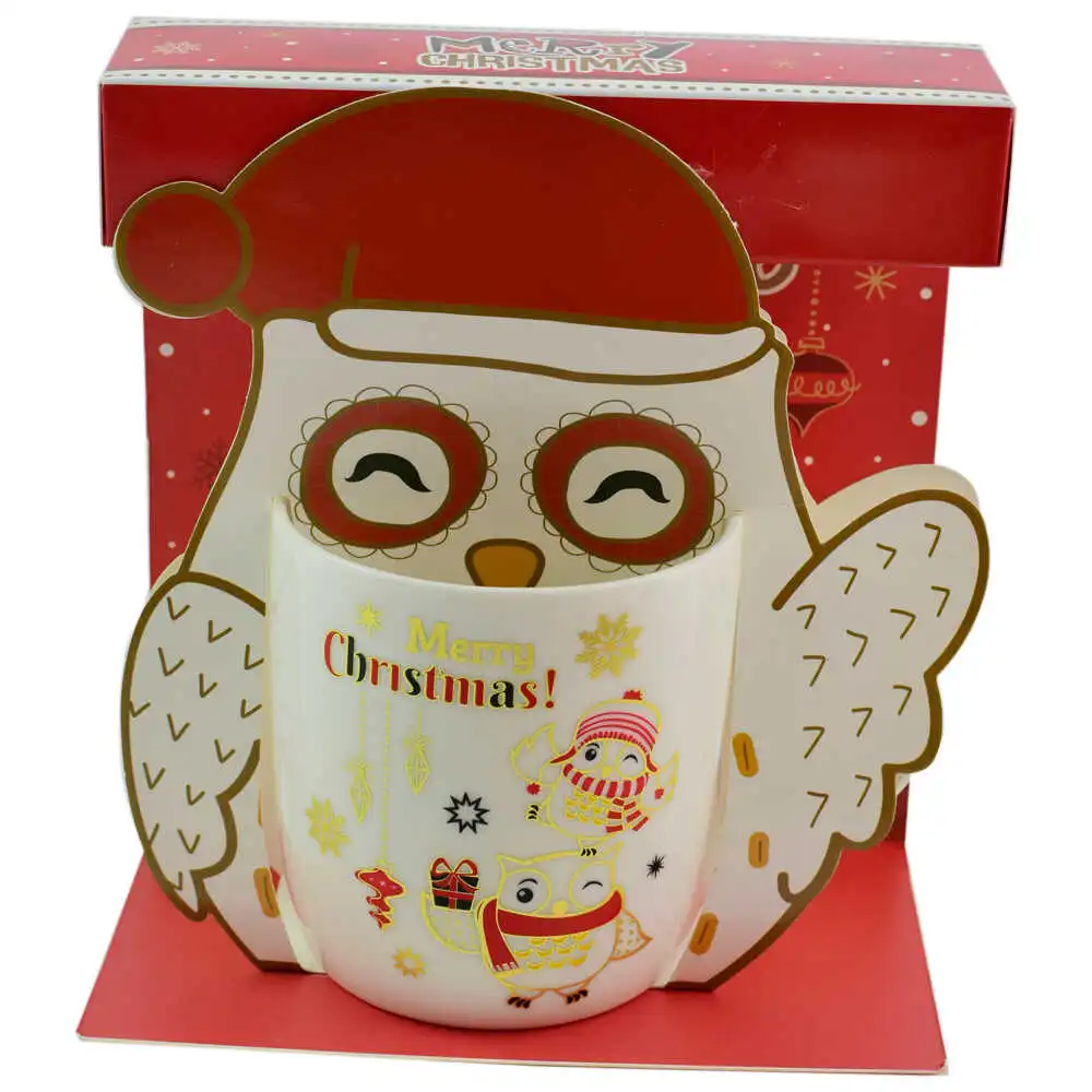 Cana de craciun realizata din ceramica in cutie - Design cu bufnite si inscriptia "Merry Christmas" - Diverse modele Cana de craciun realizata din ceramica in cutie - Design cu bufnite si inscriptia "Merry Christmas" - Diverse modele
