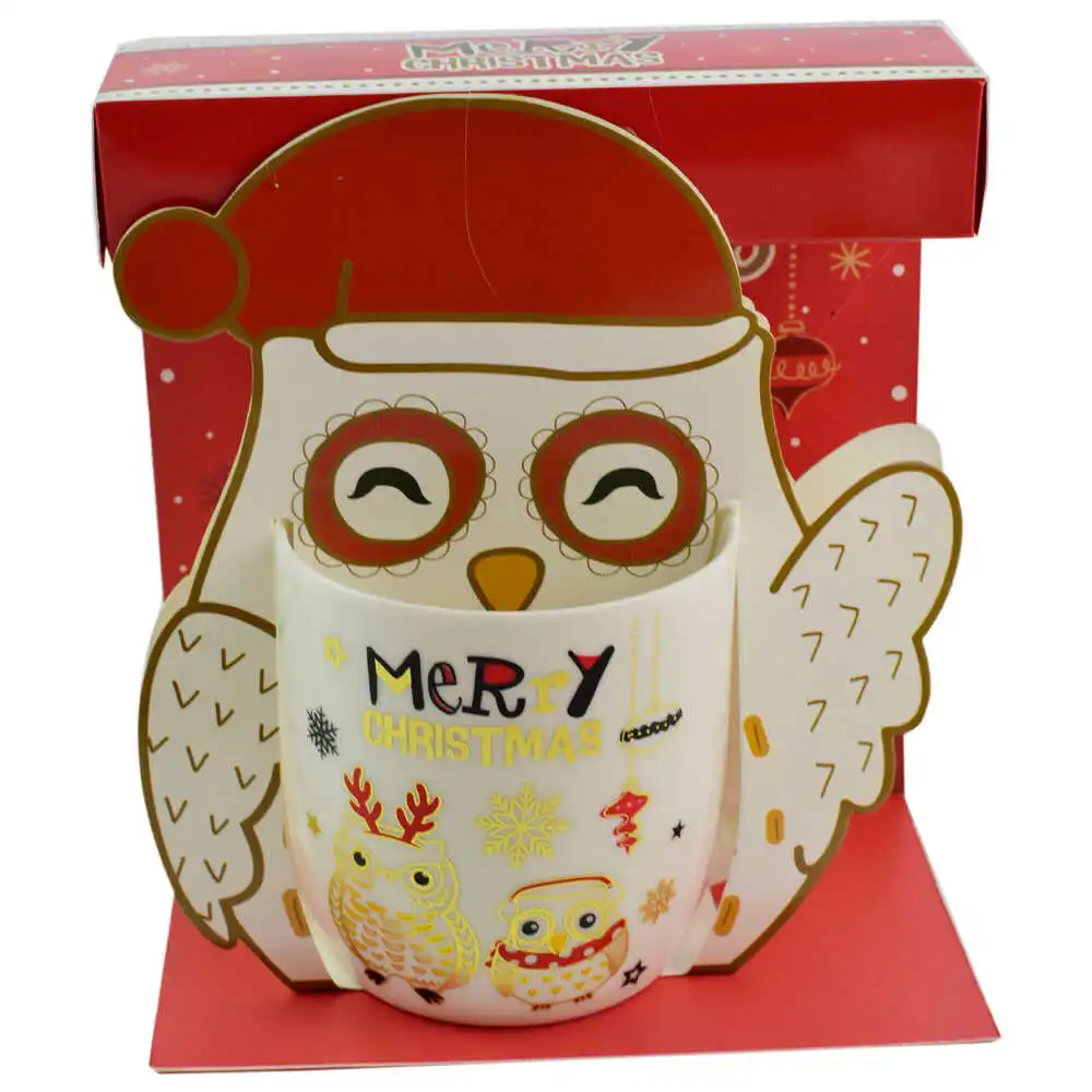Cana de craciun realizata din ceramica in cutie - Design cu bufnite si inscriptia "Merry Christmas" - Diverse modele Cana de craciun realizata din ceramica in cutie - Design cu bufnite si inscriptia "Merry Christmas" - Diverse modele