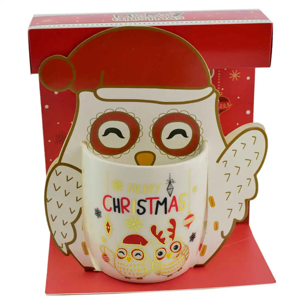 Cana de craciun realizata din ceramica in cutie - Design cu bufnite si inscriptia "Merry Christmas" - Diverse modele Cana de craciun realizata din ceramica in cutie - Design cu bufnite si inscriptia "Merry Christmas" - Diverse modele