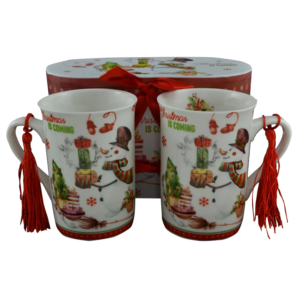 Set 2 cani Craciun din ceramica in cutie cadou - Design om de zapada Set 2 cani Craciun din ceramica in cutie cadou - Design om de zapada