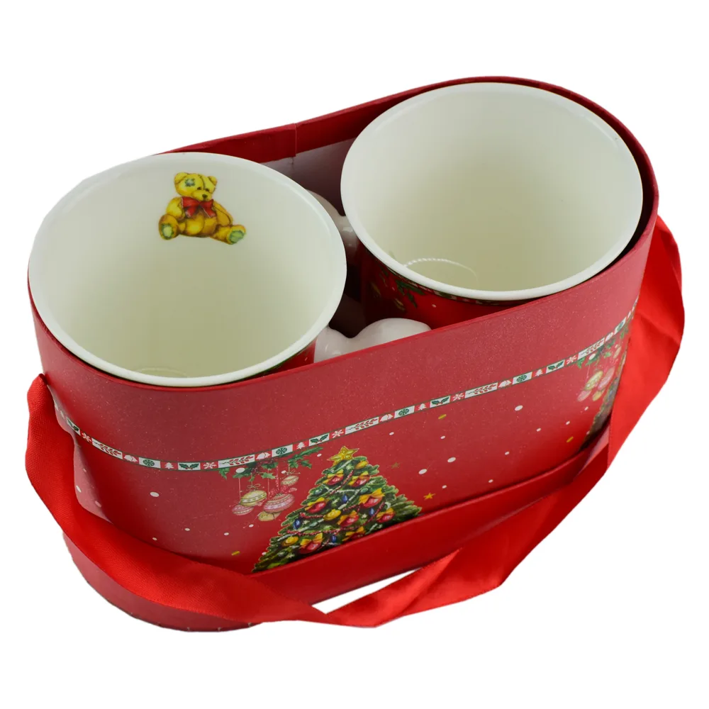 Set cana de craciun realizata din ceramica in cutie cadou - Design cu pom de Craciun Set cana de craciun realizata din ceramica in cutie cadou - Design cu pom de Craciun