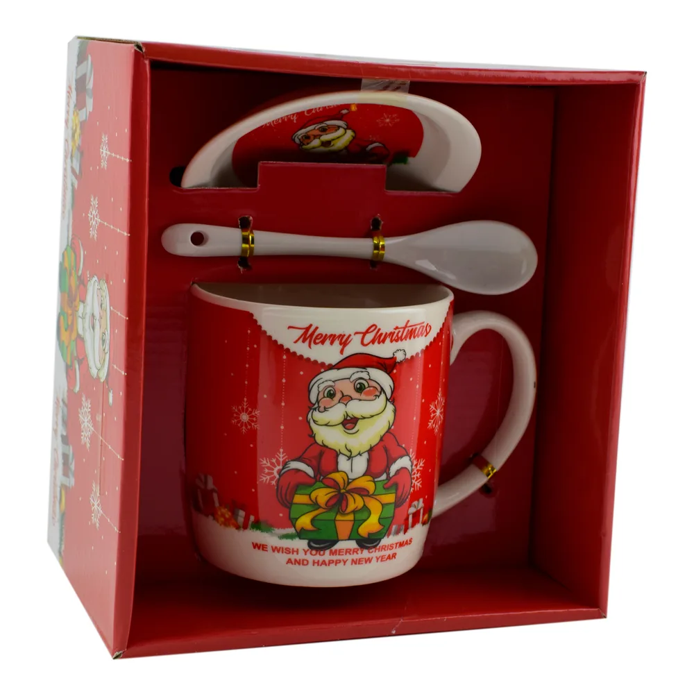 Set Cana de craciun cu farfurie si lingura realizata din ceramica in cutie - Design Mos Nicolae si inscriptia "Merry Christmas" - Diverse modele (Model 1) Set Cana de craciun cu farfurie si lingura realizata din ceramica in cutie - Design Mos Nicolae si inscriptia "Merry Christmas" - Diverse modele (Model 1)