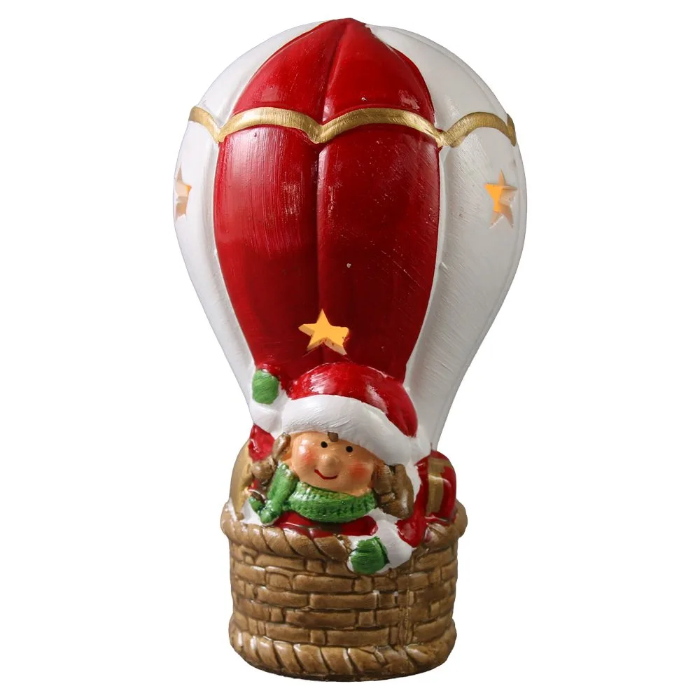Figurina decorativa de Craciun din ceramica 9x15.5 cm - Copil in balon cu aer cald