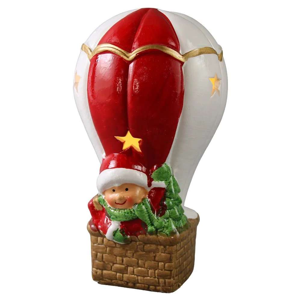 Figurina decorativa de Craciun din ceramica 9x15.5 cm - Copil in balon cu aer cald